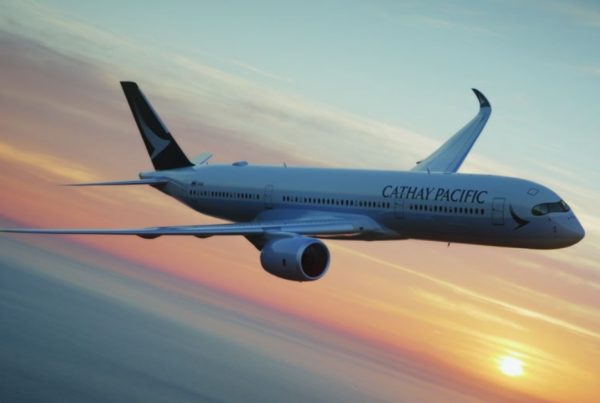 cathay pacific plane banking on horizon